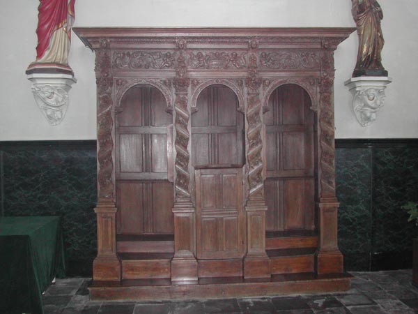 Restauratie van de biechtstoel te Bassevelde.